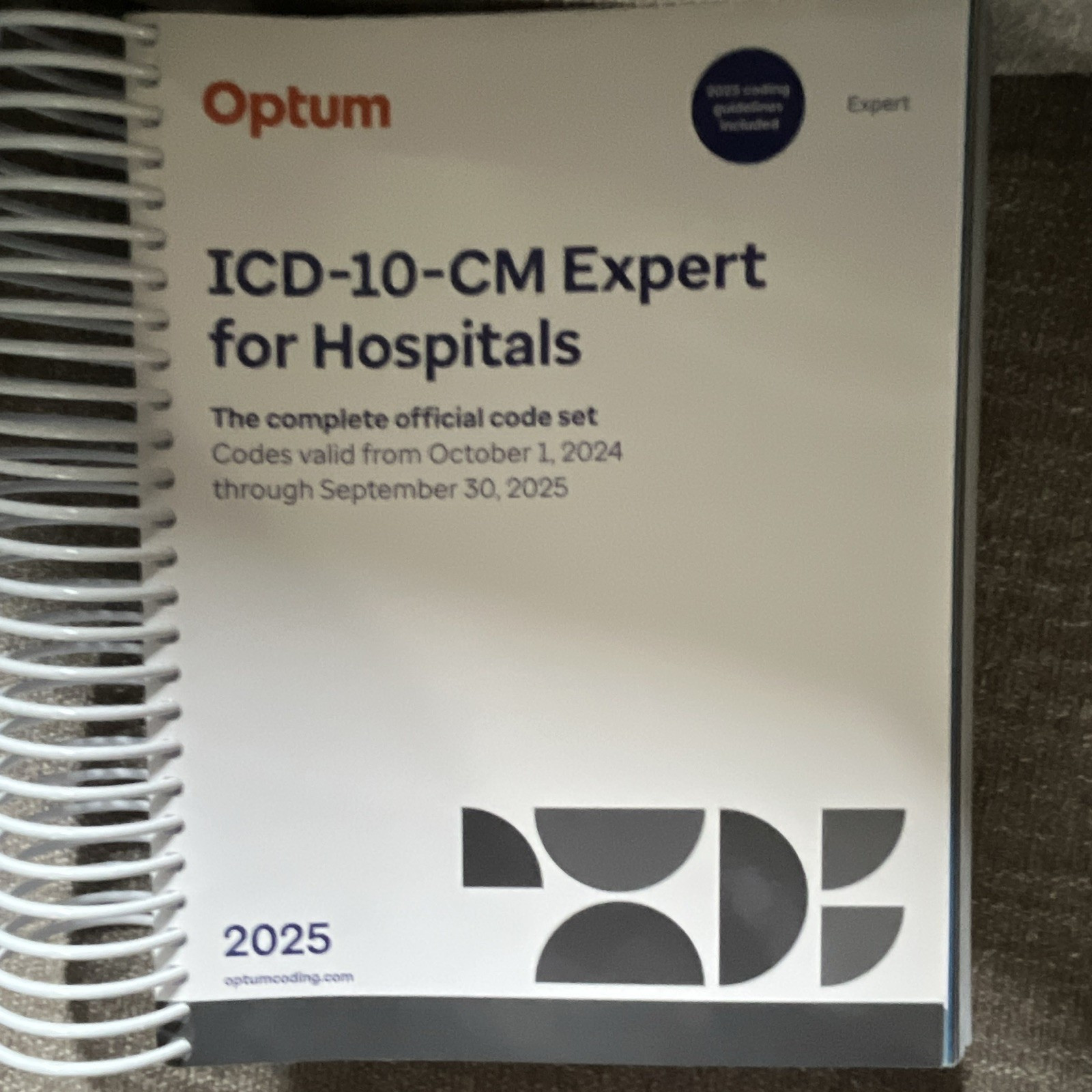 Optum ICD-10-CM Expert for Hospitals 2025 Spiral Bound Medical Coding Textbook