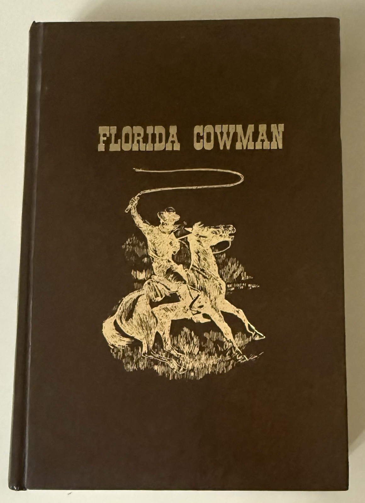 FLORIDA COWMAN: A HISTORY OF FLORIDA CATTLE RAISING by JOE A. AKERMAN
