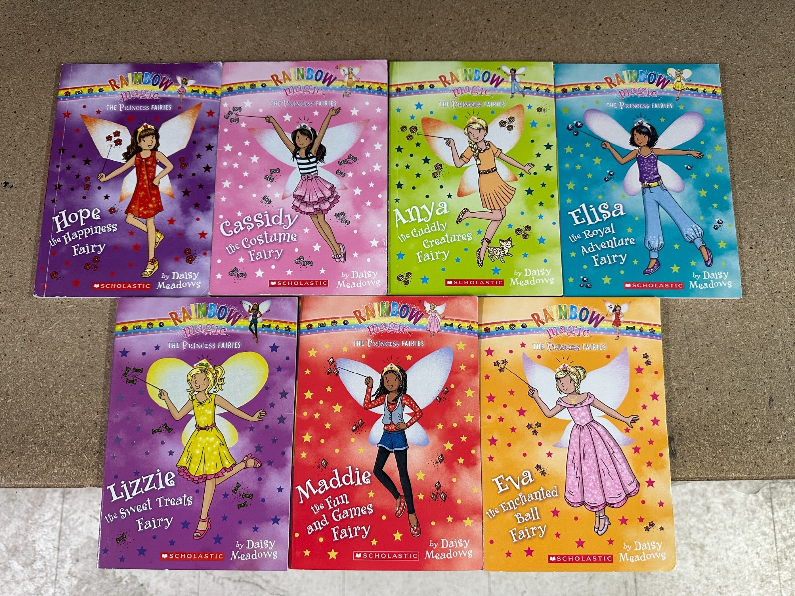Daisy Meadows : Complete 1-7 Set Rainbow Magic Paperback Books – Good