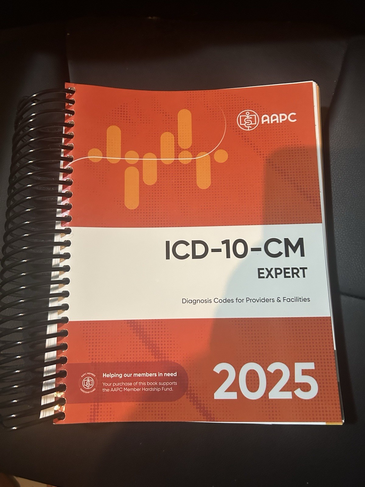 AAPC ICD-10-CM Expert 2025 Spiral Bound Paperback Medical Coding Textbook