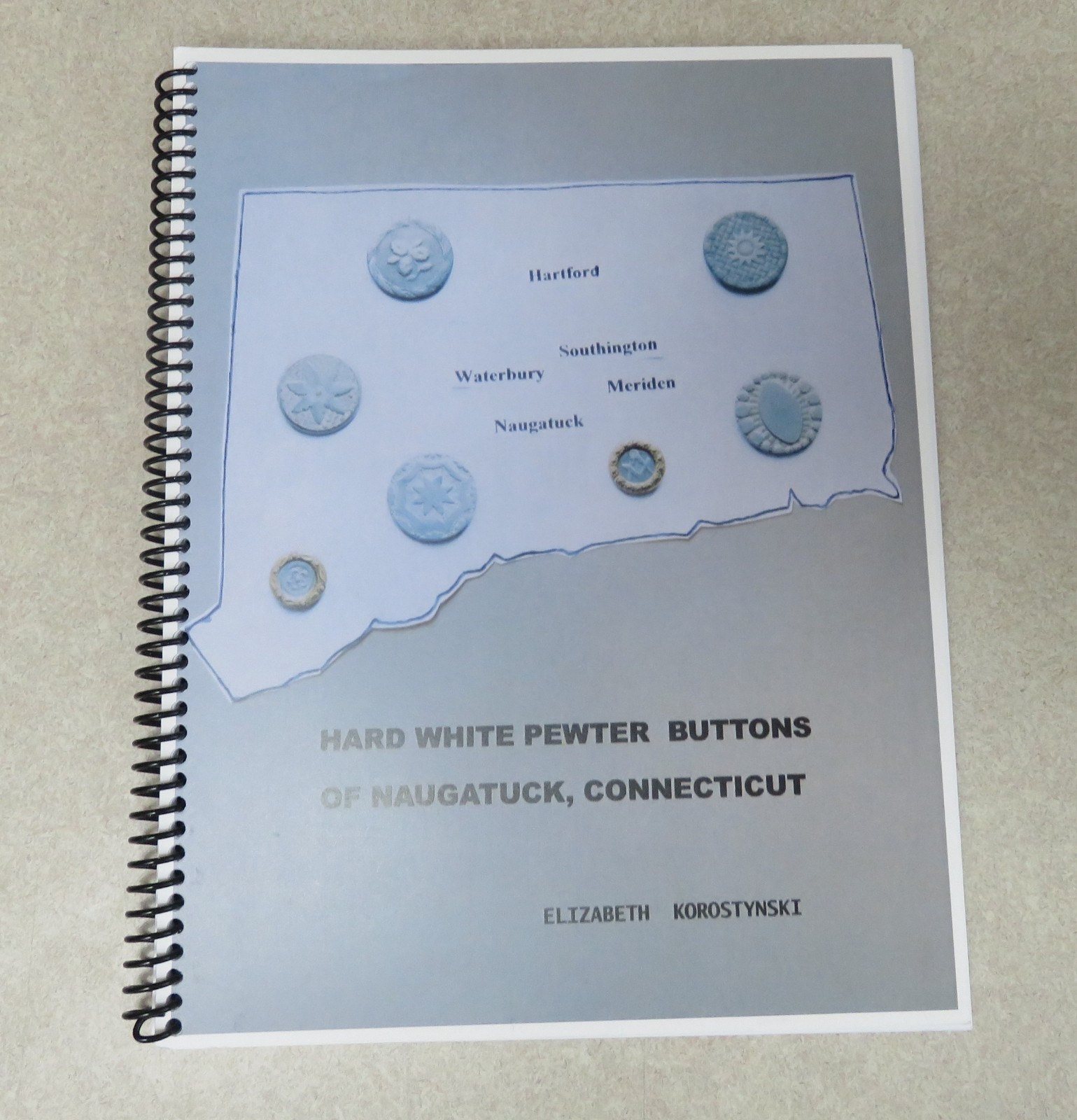 HARD WHITE PEWTER BUTTON BOOK