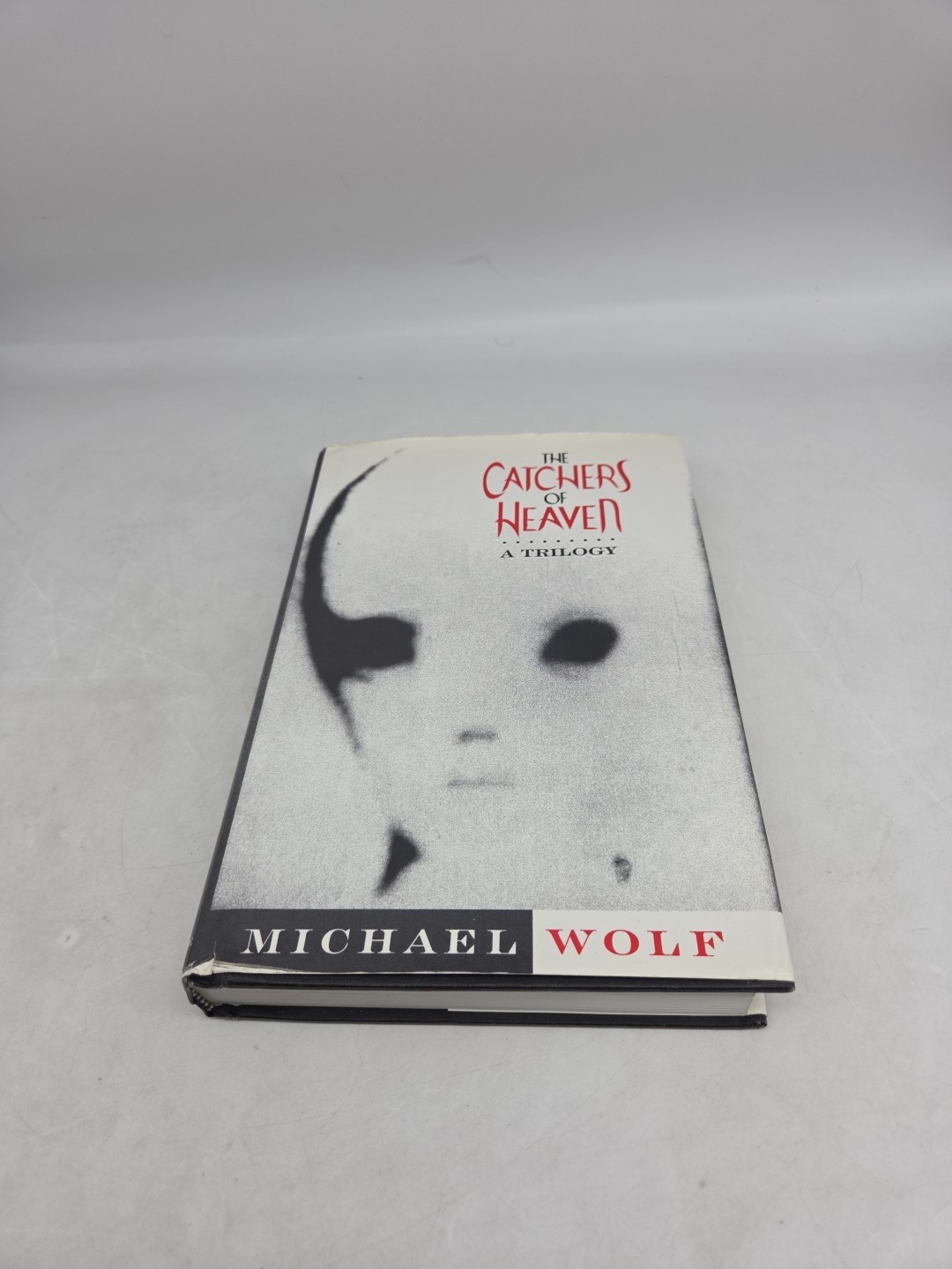 The Catchers of Heaven: Trilogy – (Michael Wolf, HCDJ, 1996, Second Printing)