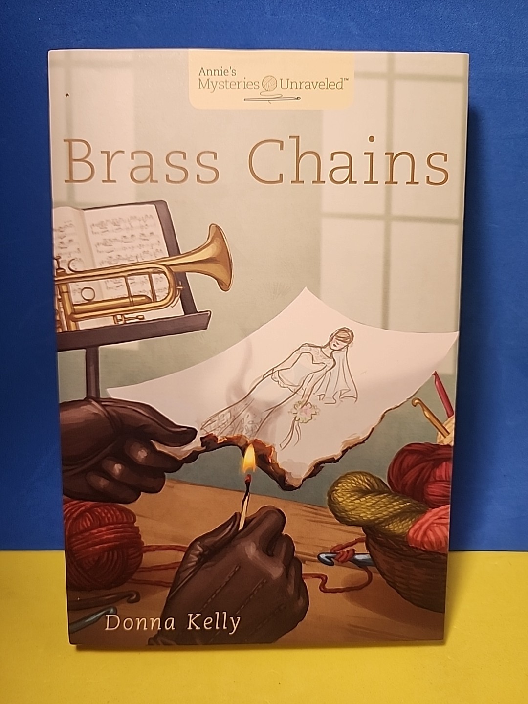 Annie&rsquo;s Mysteries Unraveled – Brass Chains by Donna Kelly HC 2015