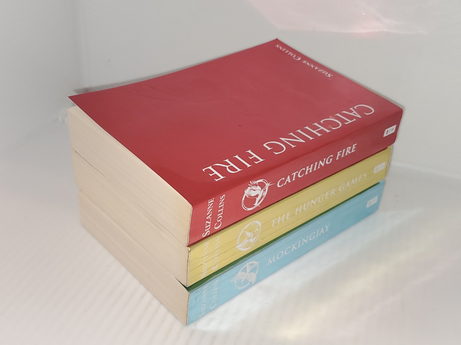 The Hunger Games Box Set: Foil Edition, Paperback by Suzanne Collins.