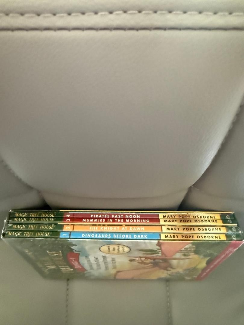 BRAND NEW NEVER OPENED MAGIC TREEHOUSE BOOKS 1-4