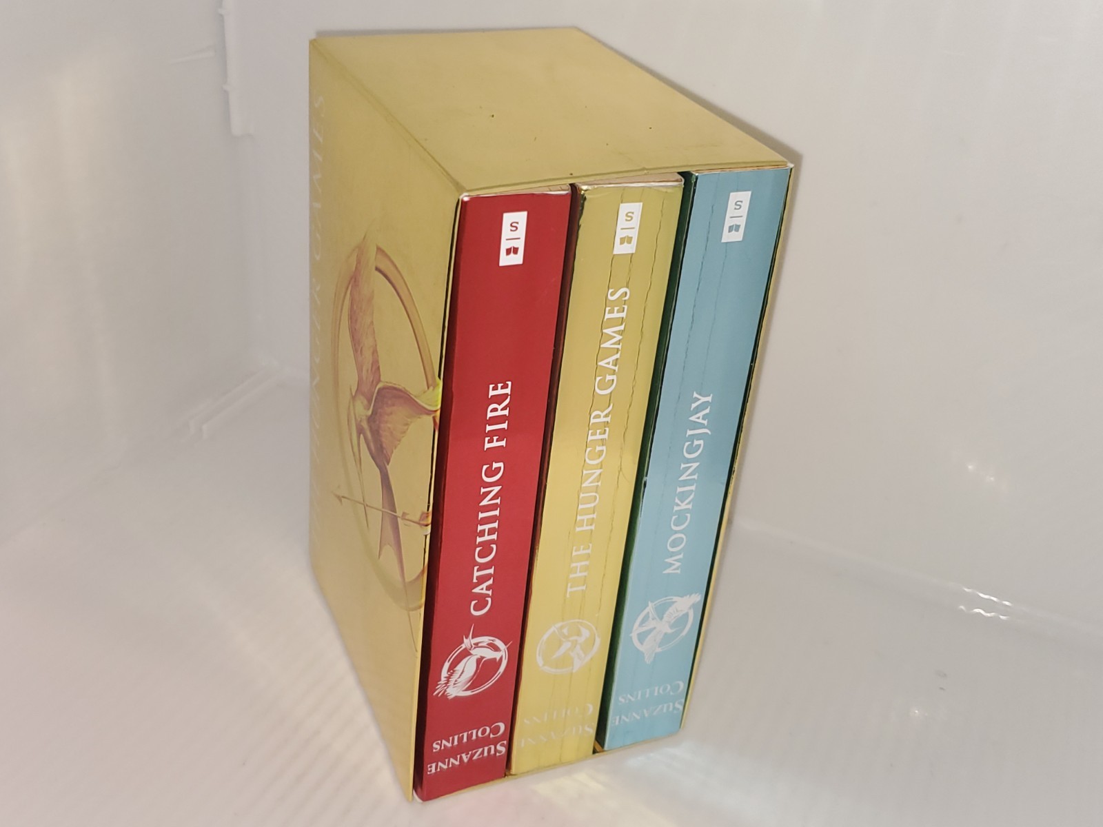 The Hunger Games Box Set: Foil Edition, Paperback by Suzanne Collins.