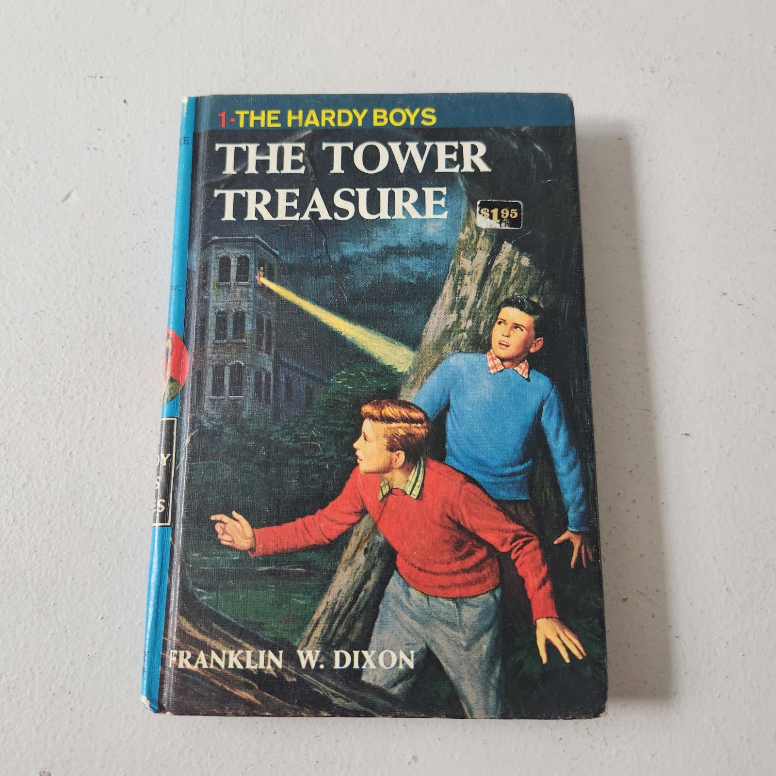 The Hardy Boys #1 The Tower Treasure $1.95 Sticker Matte Blue Hardcover Vintage